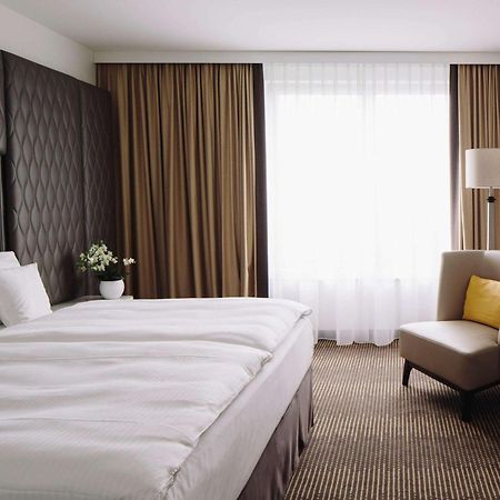โรงแรมพูลแมน เบอลิน ชไวเซอร์ฮอฟ เบอร์ลิน ภายนอก รูปภาพ A room at the Hotel de France