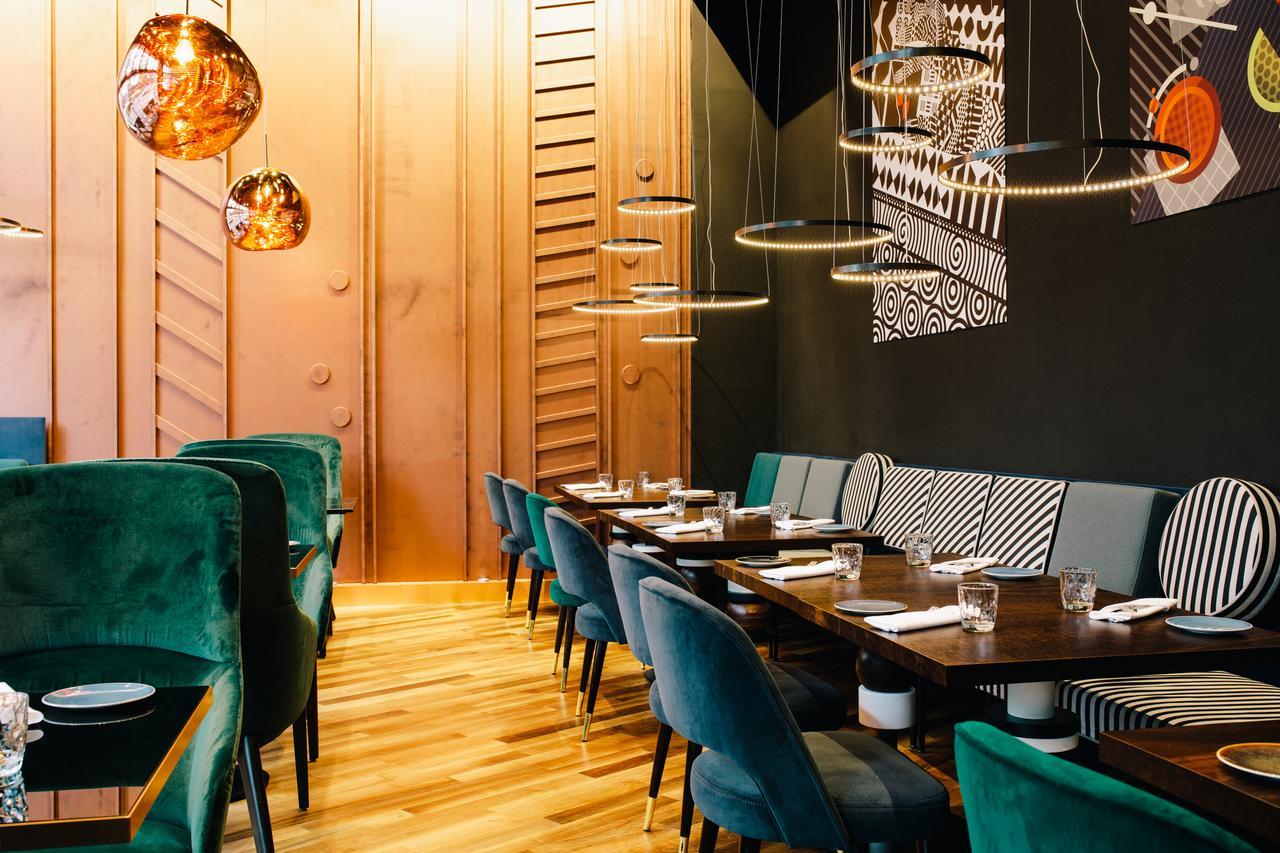 โรงแรมพูลแมน เบอลิน ชไวเซอร์ฮอฟ เบอร์ลิน ภายนอก รูปภาพ Restaurant interior